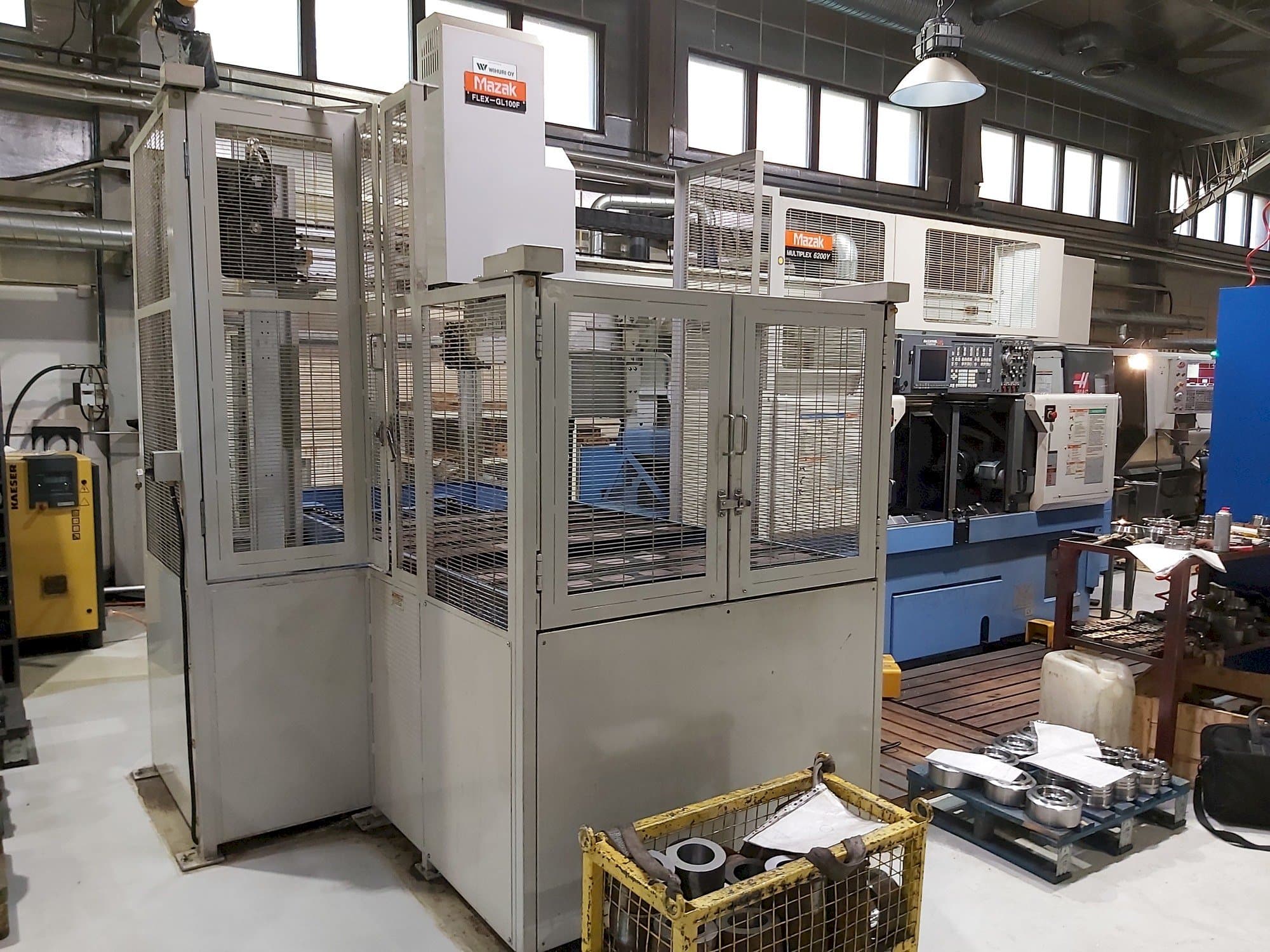 Vooraanzicht  van Mazak Multiplex 6200Y + Gantry robot  machine