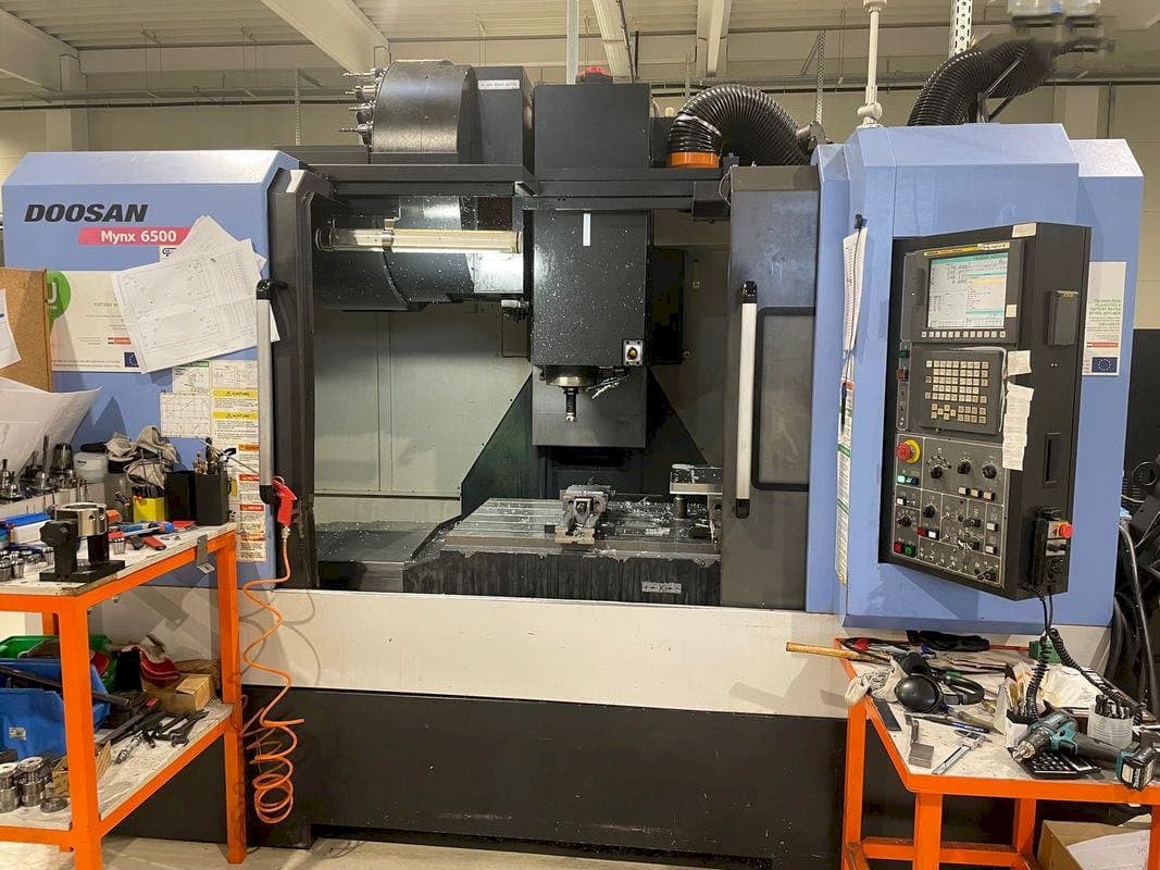 Vooraanzicht  van Doosan MYNX DNM 6500  machine