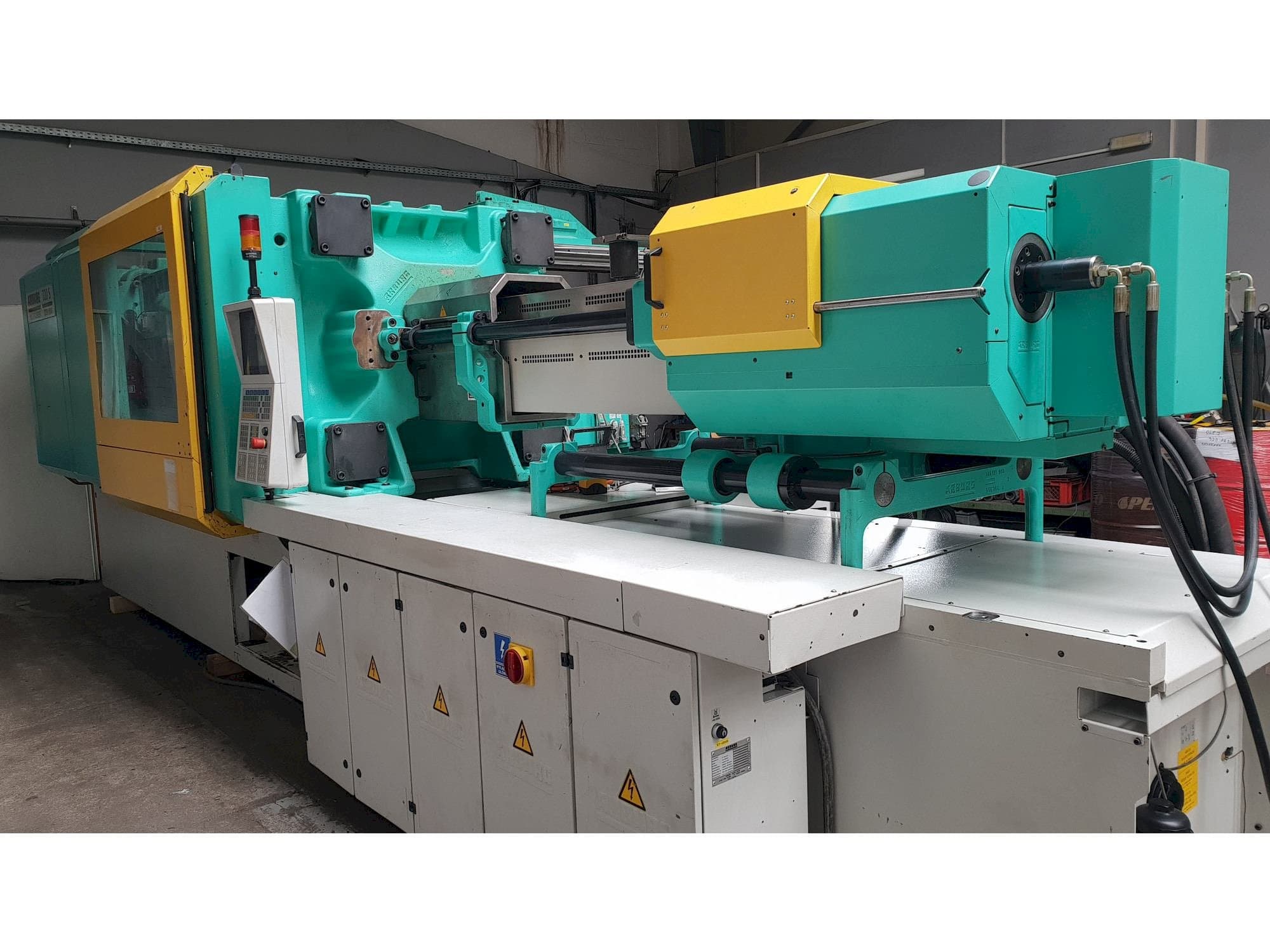 Vooraanzicht  van Arburg Multilift H 720 - 3200 - 1300  machine