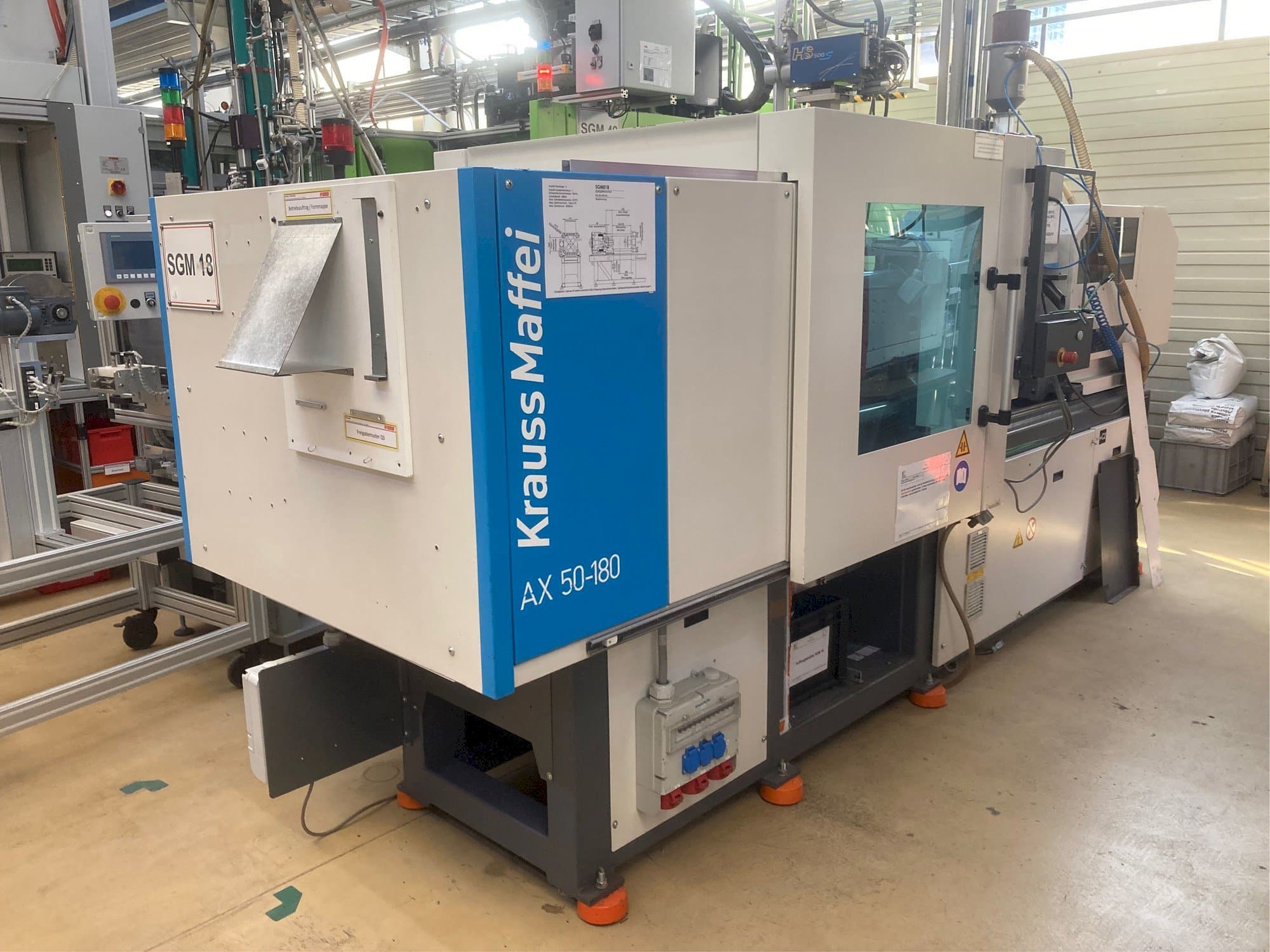 Linkerzijdeaanzicht  van Krauss Maffei AX 50-180  machine