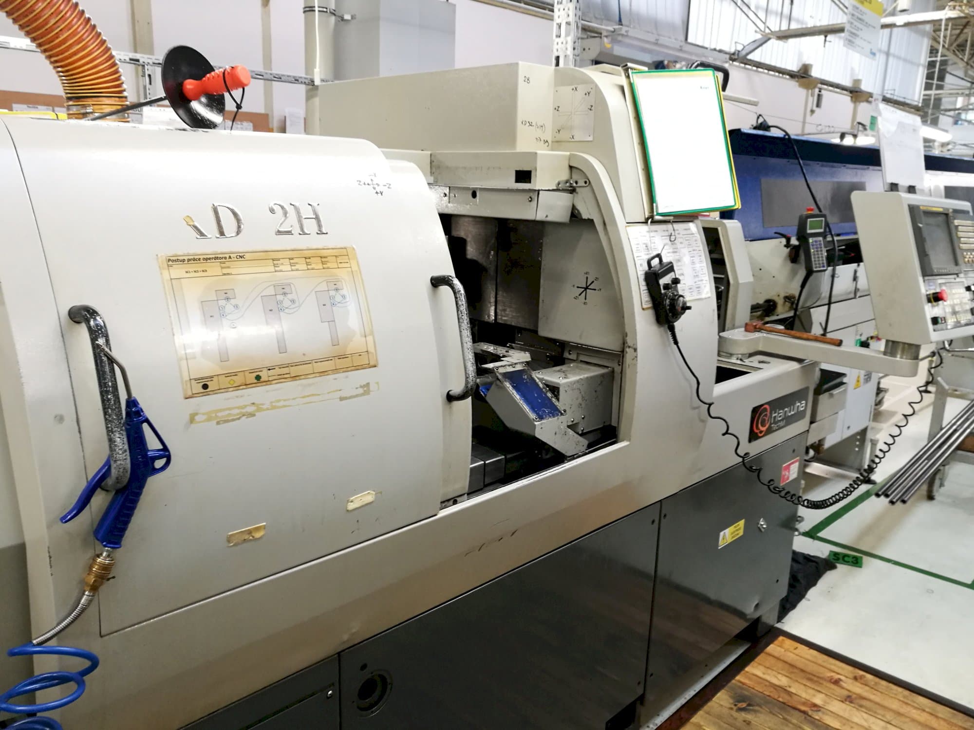 Recht aanzicht  van Hanwha XD 32 H machine