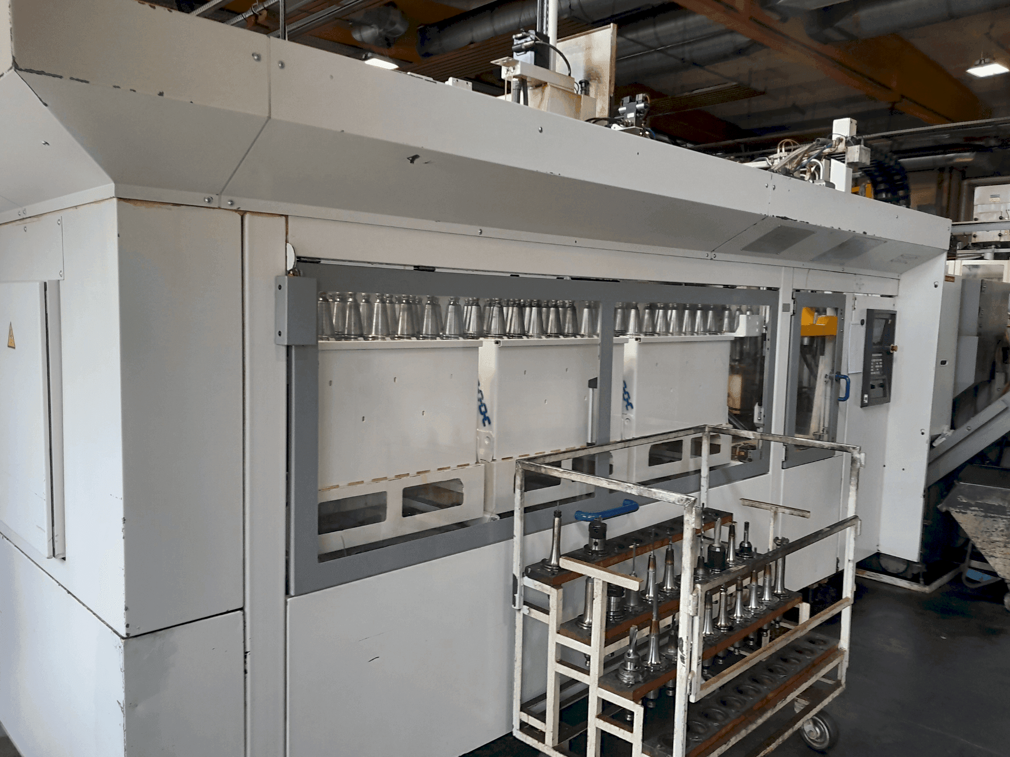 Zijaanzicht  van HELLER MCS-H 250  machine