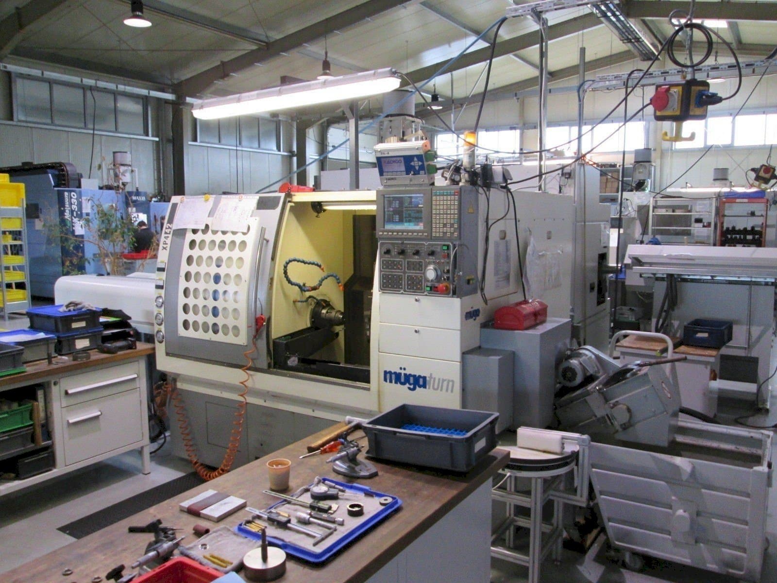 Vooraanzicht  van Muga XP4 – 42SM  machine