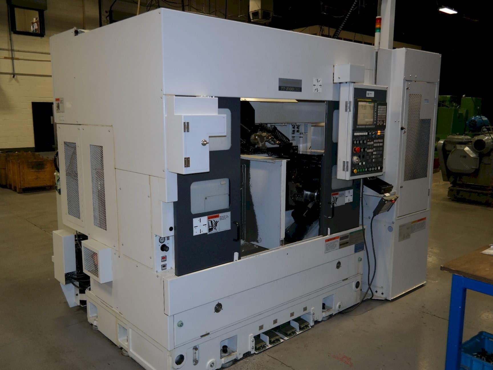 Vooraanzicht  van Takisawa TT2100CMGA  machine