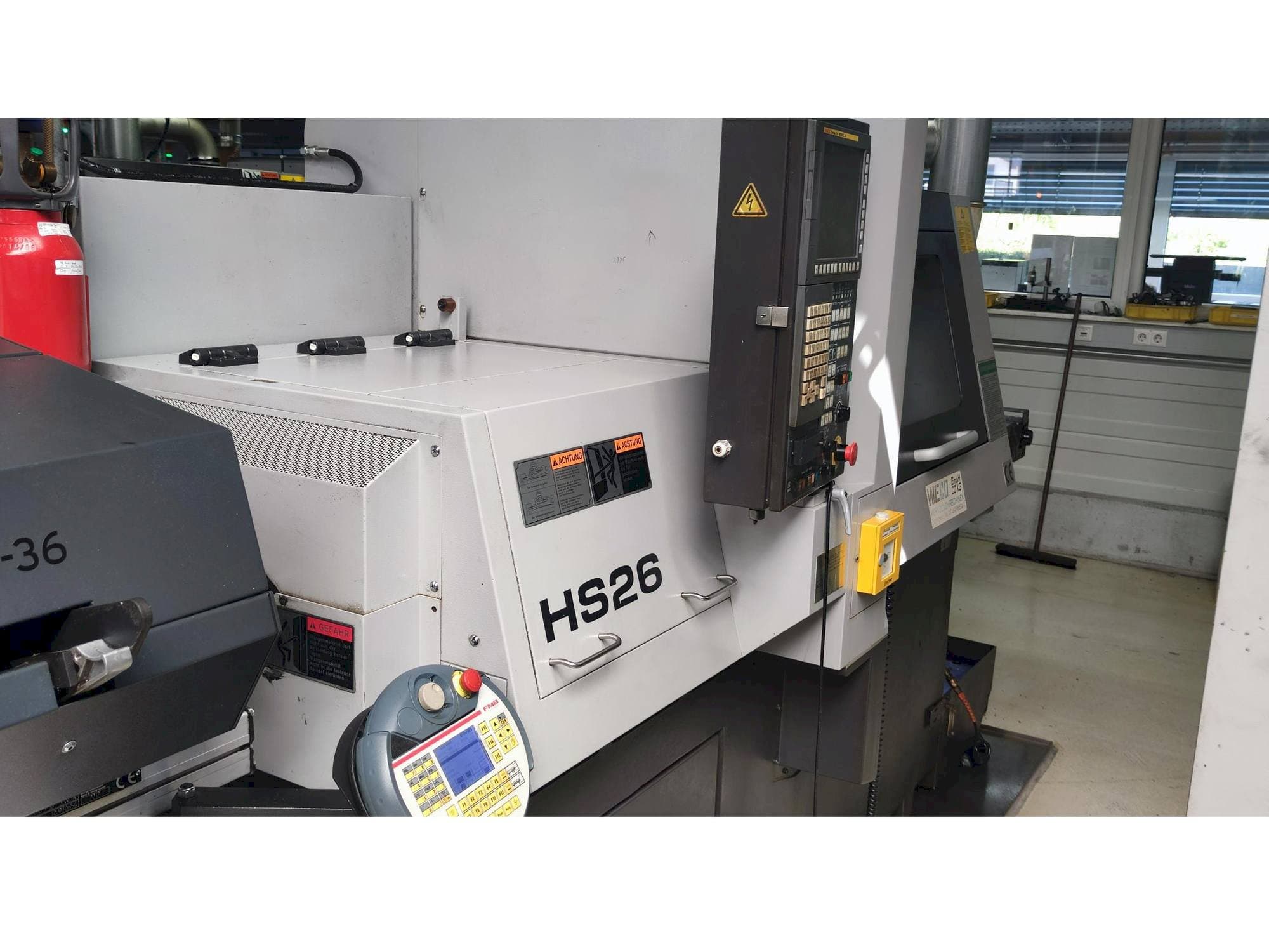 Linkerzijdeaanzicht  van TSUGAMI HS26  machine