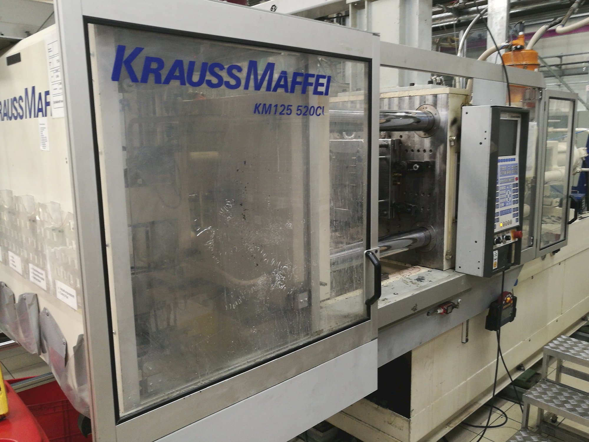Vooraanzicht  van Krauss Maffei KM 125-520 C1 machine