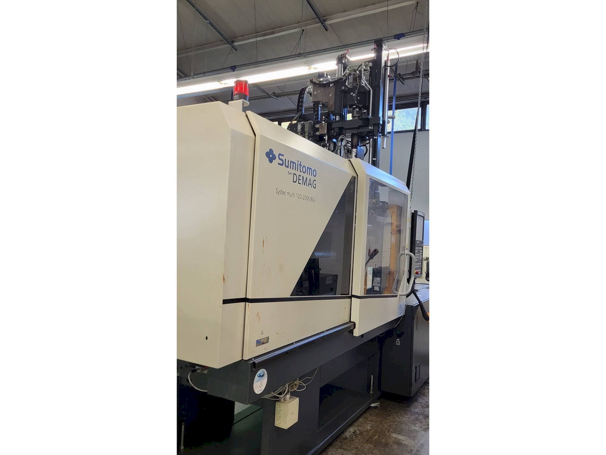 Linkerzijdeaanzicht  van Sumitomo SHI DEMAG Systec Multi 120/470-200h/80V  machine