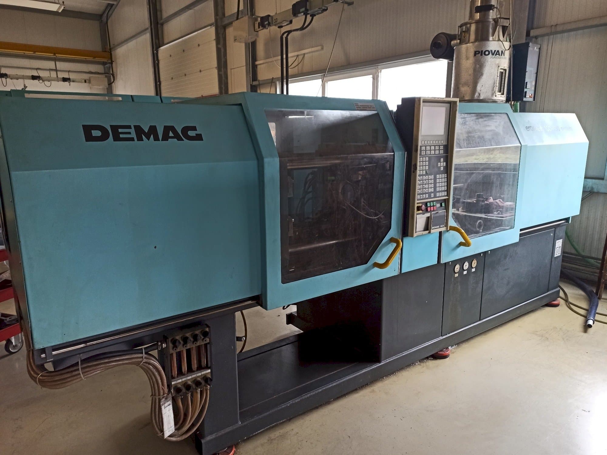 Linkerzijdeaanzicht  van DEMAG Ergotech 150-610 Compact  machine