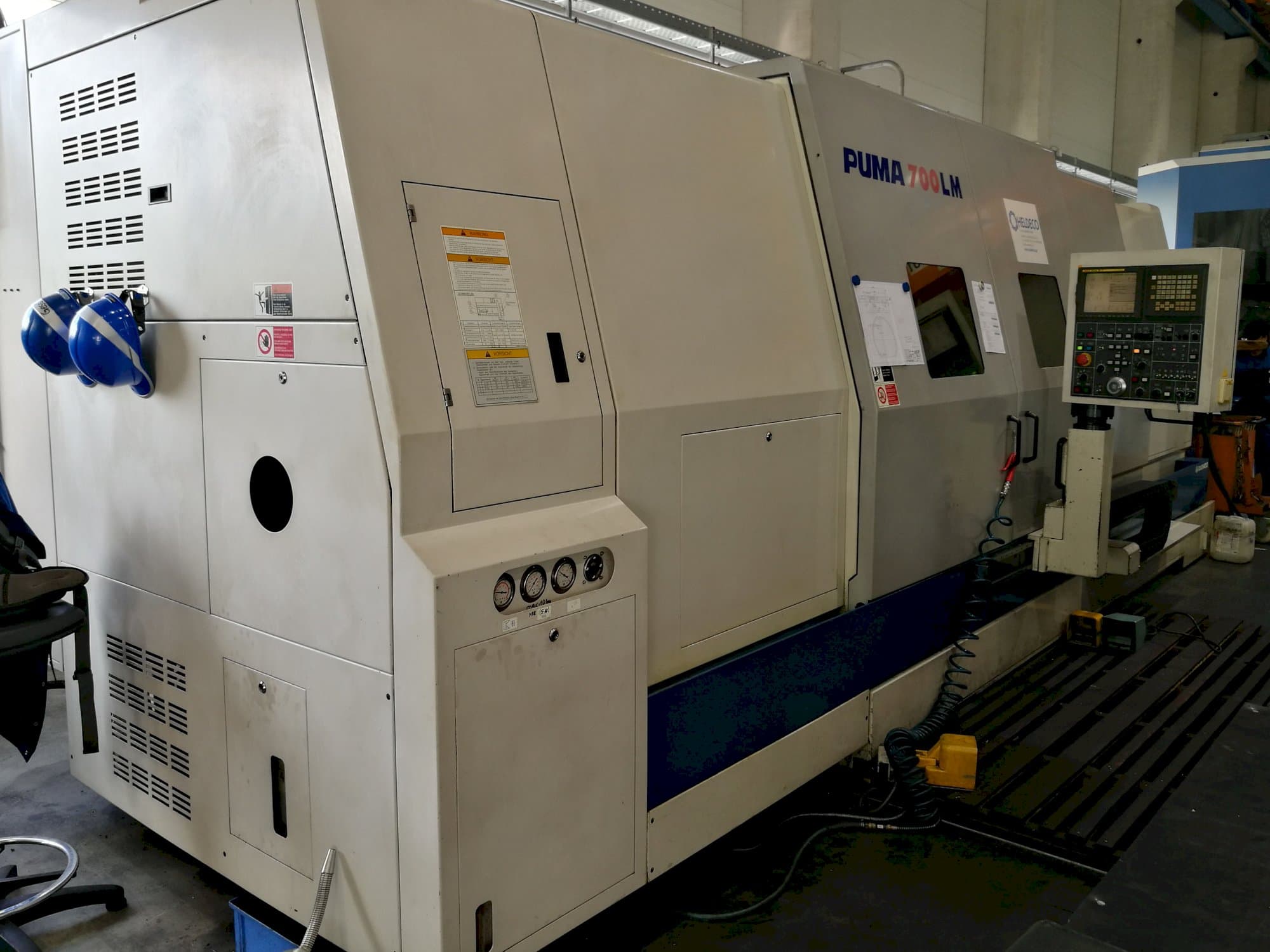Links zicht  van Doosan Puma 700 LM machine