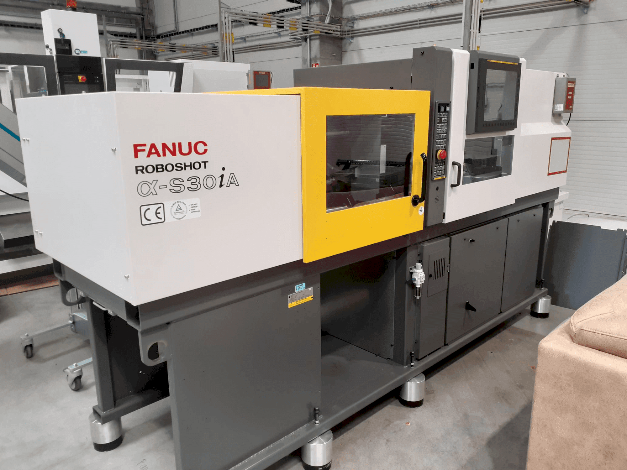 Vooraanzicht  van FANUC ROBOSHOT α-S 30iA  machine