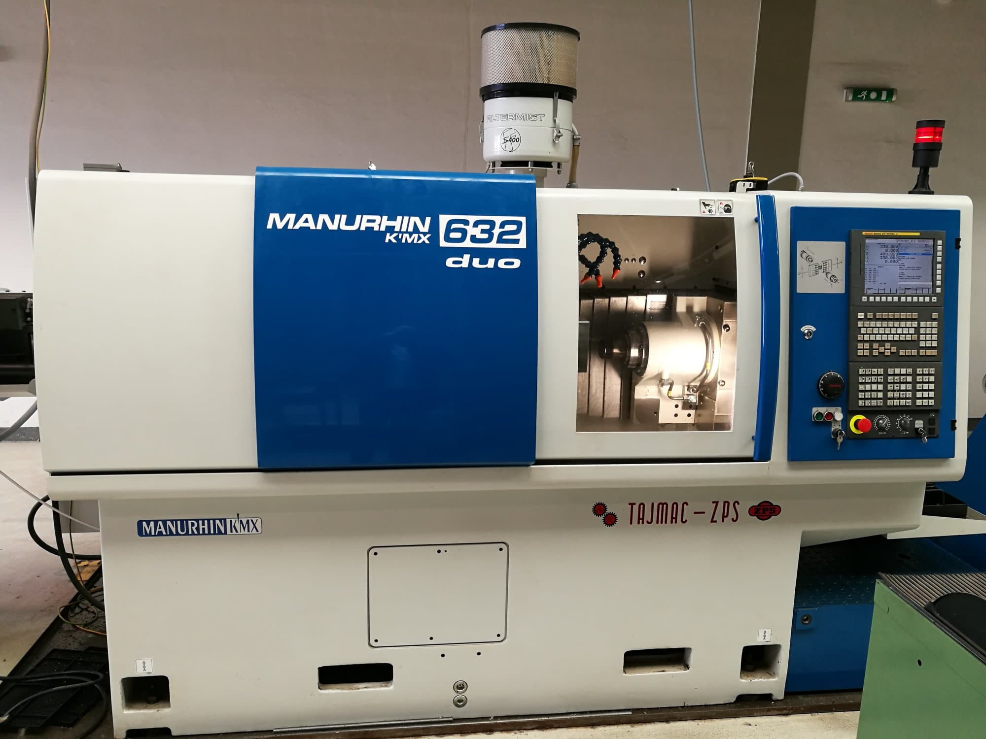 Vooraanzicht  van TAJMAC-ZPS MANURHIN K'MX 632 DUO machine