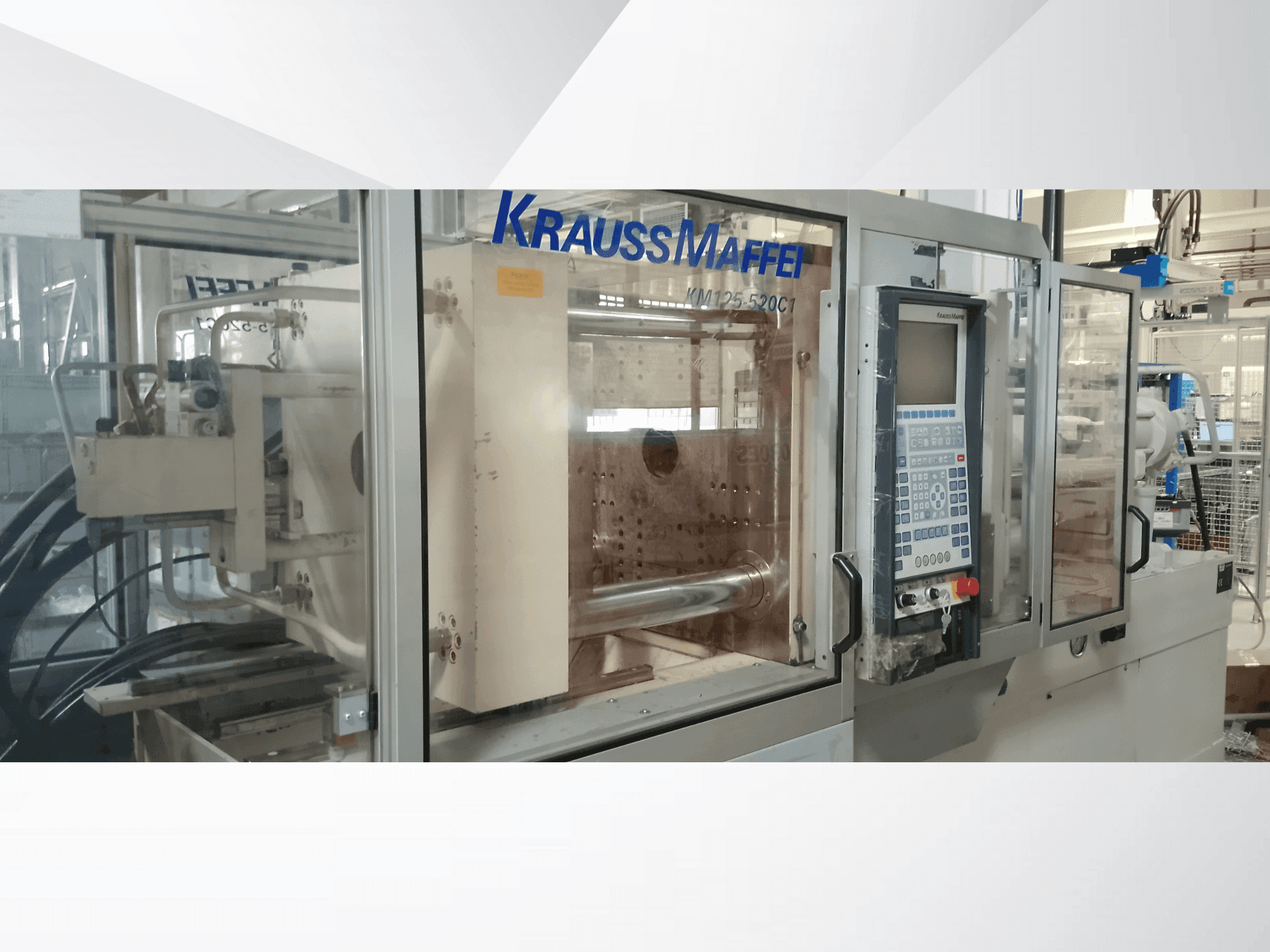 Vooraanzicht van Krauss Maffei 125-520 C1 machine