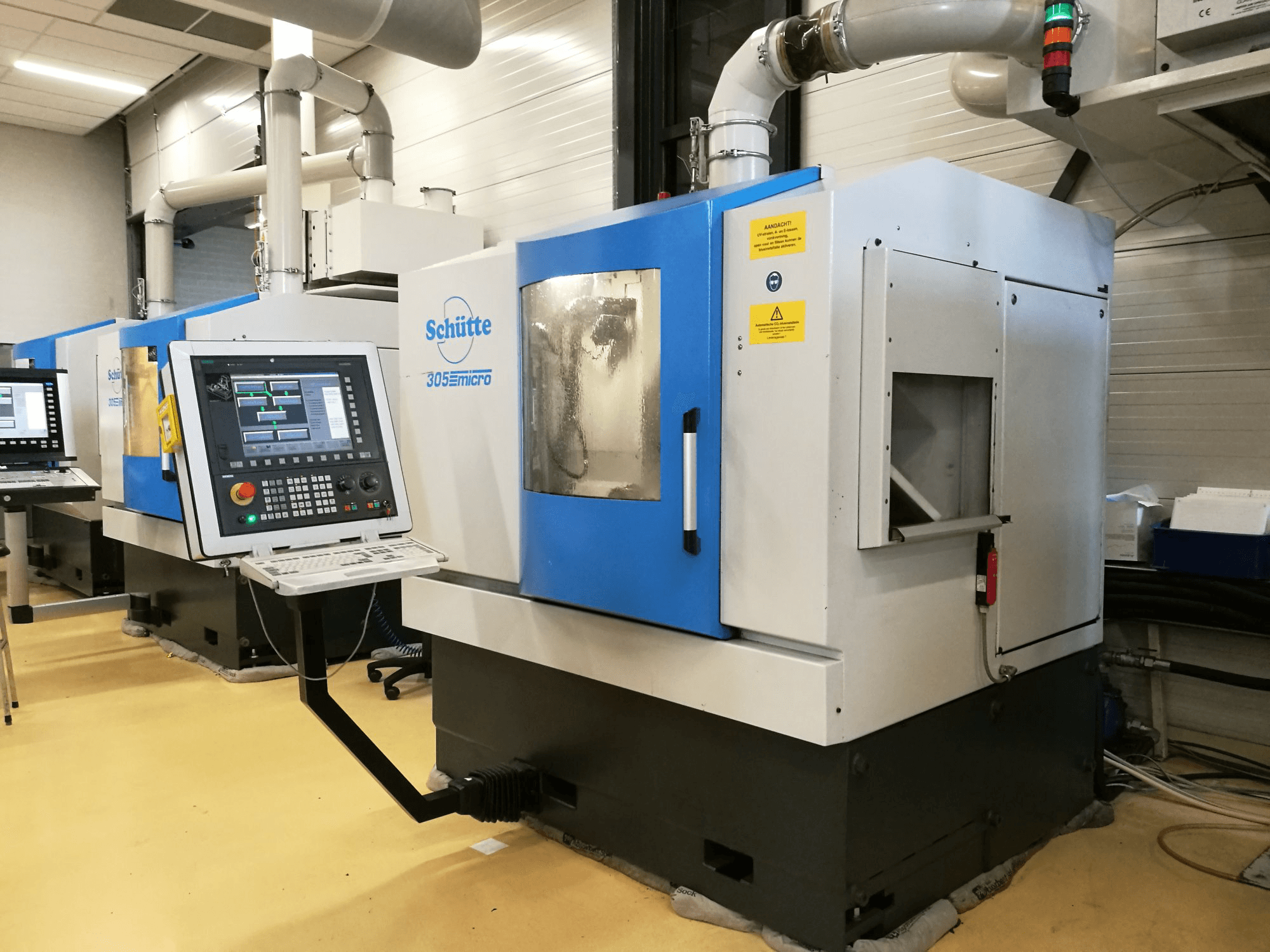 Recht aanzicht van Schuette WU305L machine