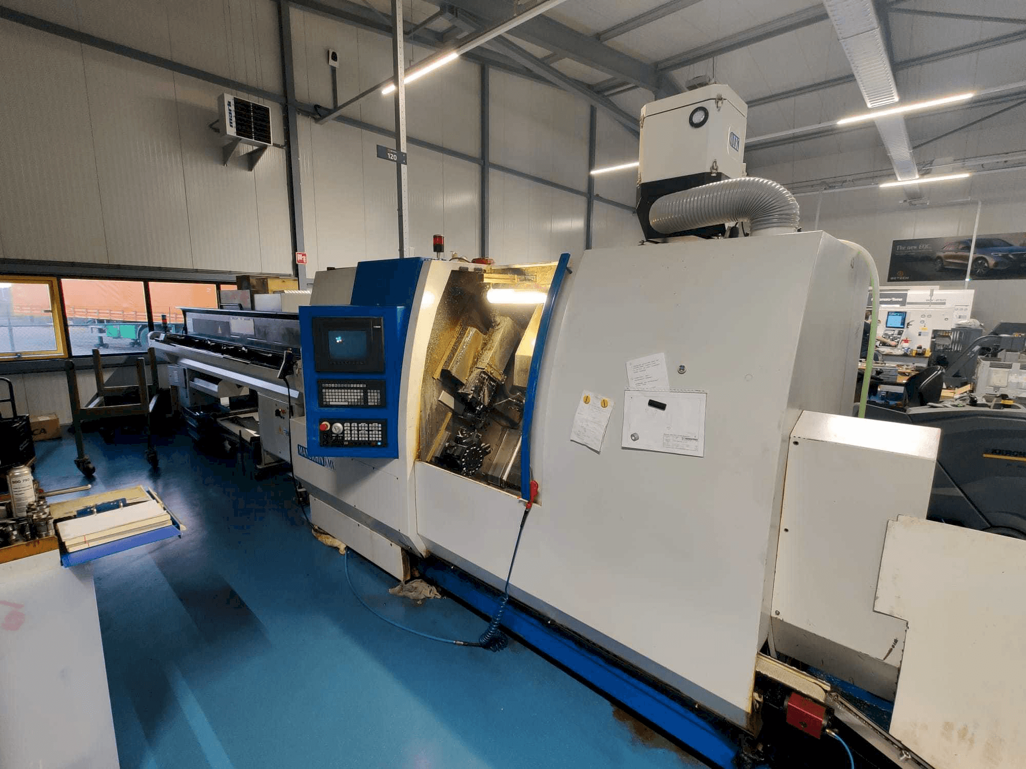 Vooraanzicht van Manurhin K'MX XL 32 machine