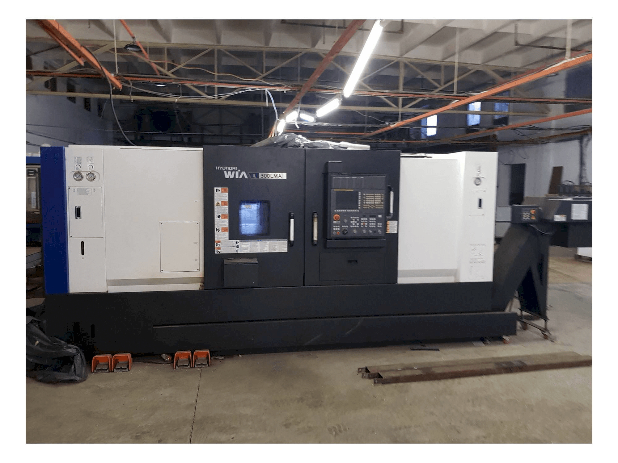 Vooraanzicht van Hyundai Wia L300LMA machine