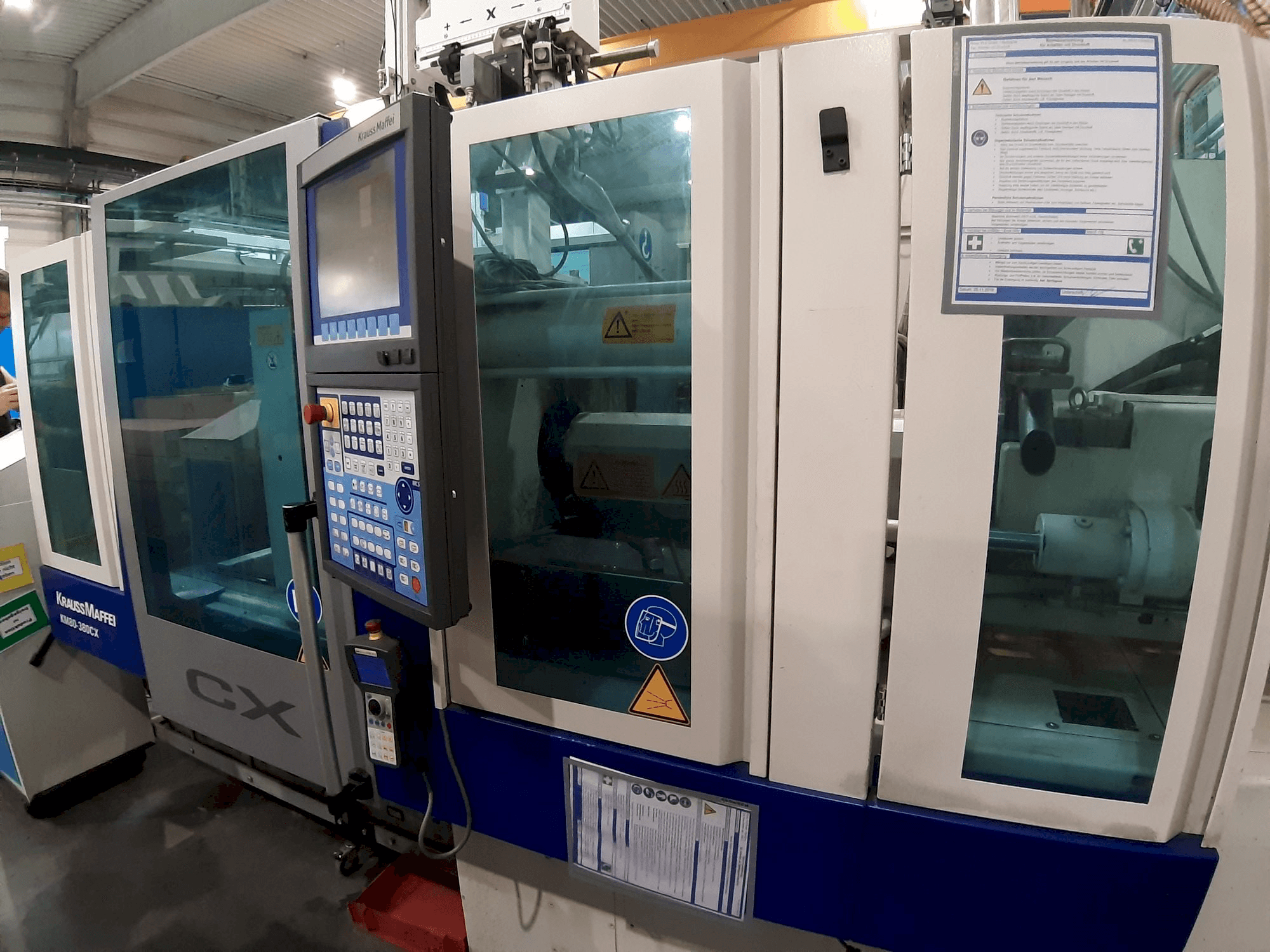 Vooraanzicht van Krauss Maffei 80 - 380 CX machine