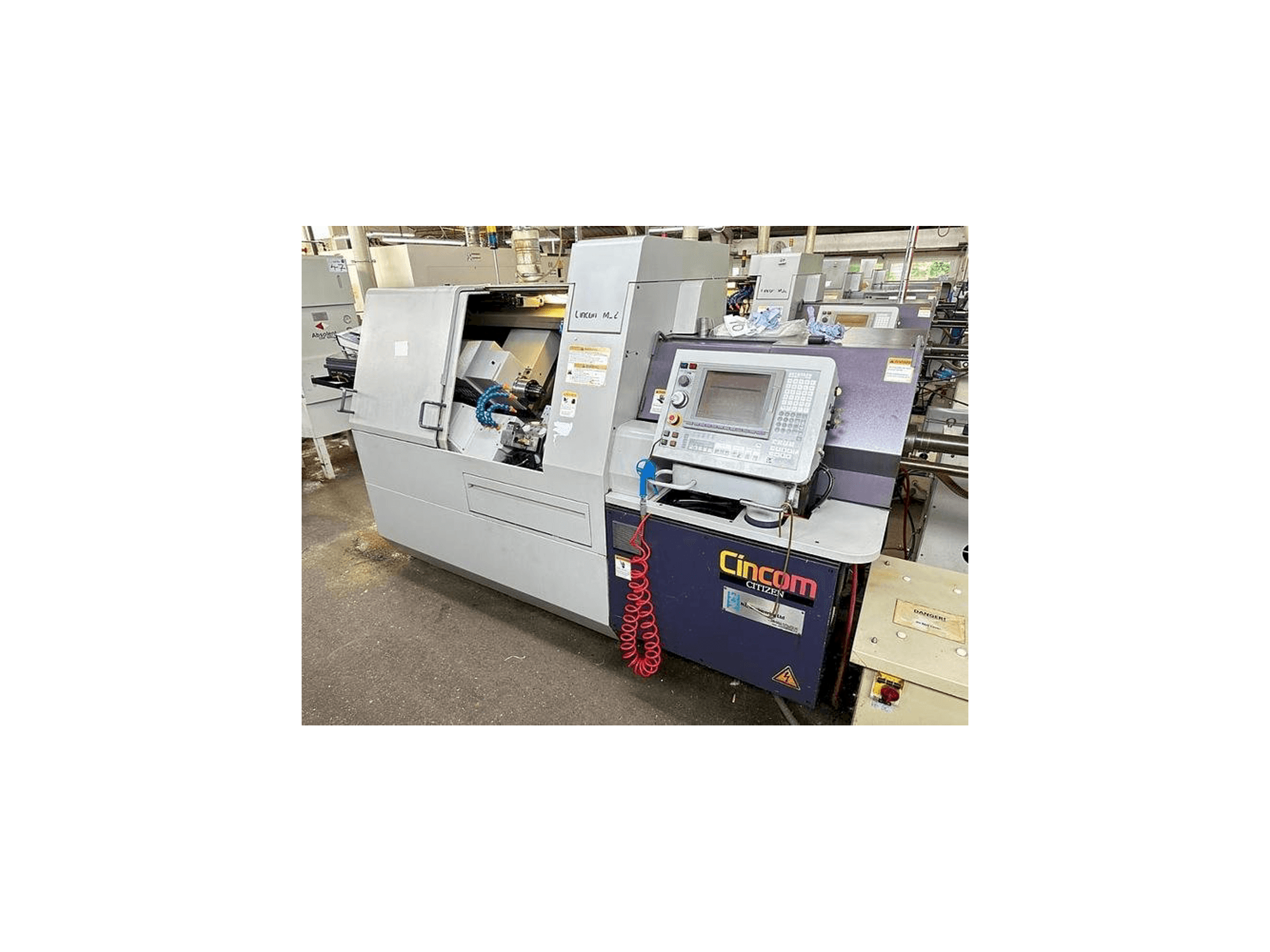 Vooraanzicht van Citizen M32 III machine