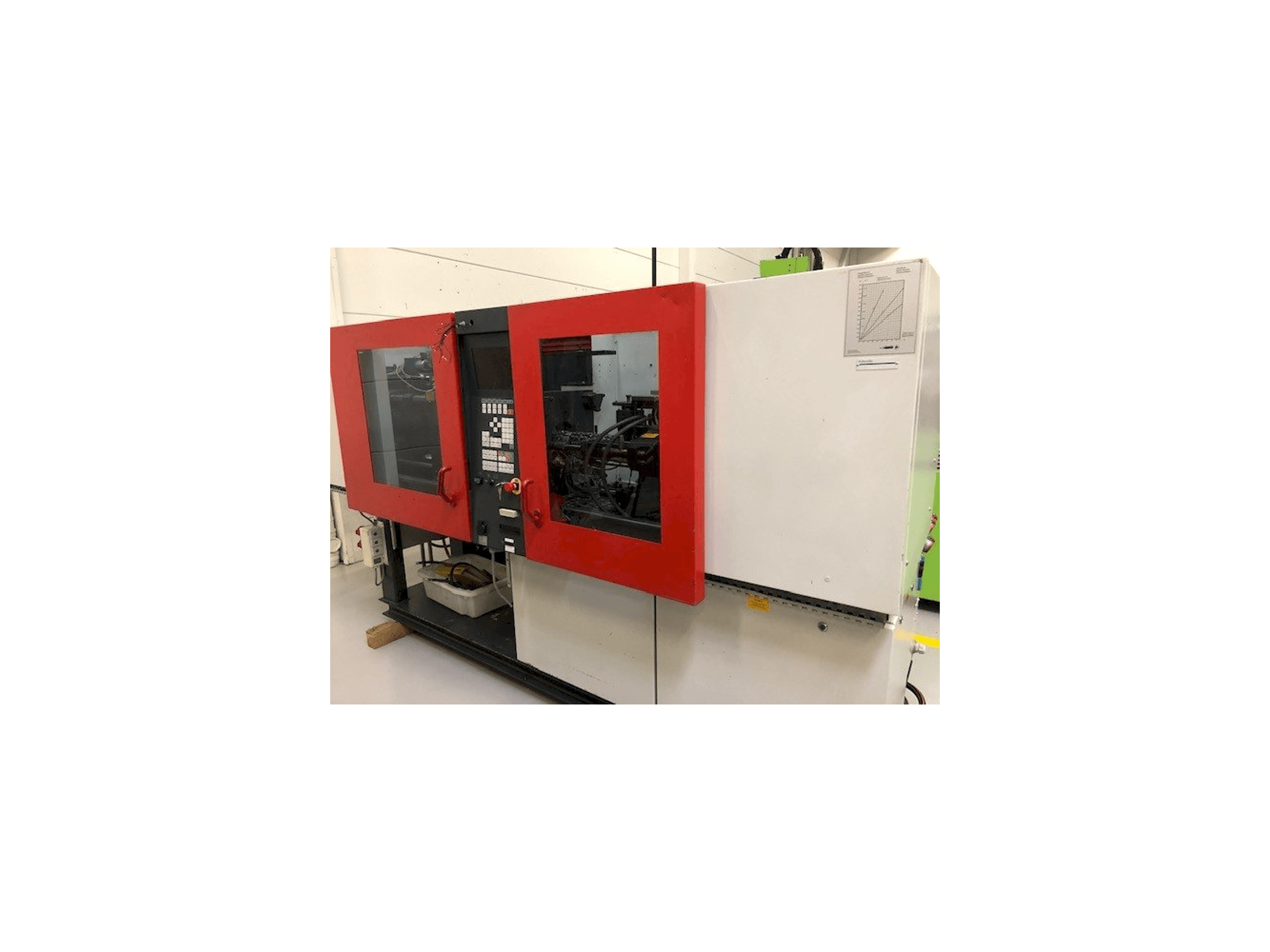 Linkerzijdeaanzicht van FERROMATIK MILACRON K40 D-E machine