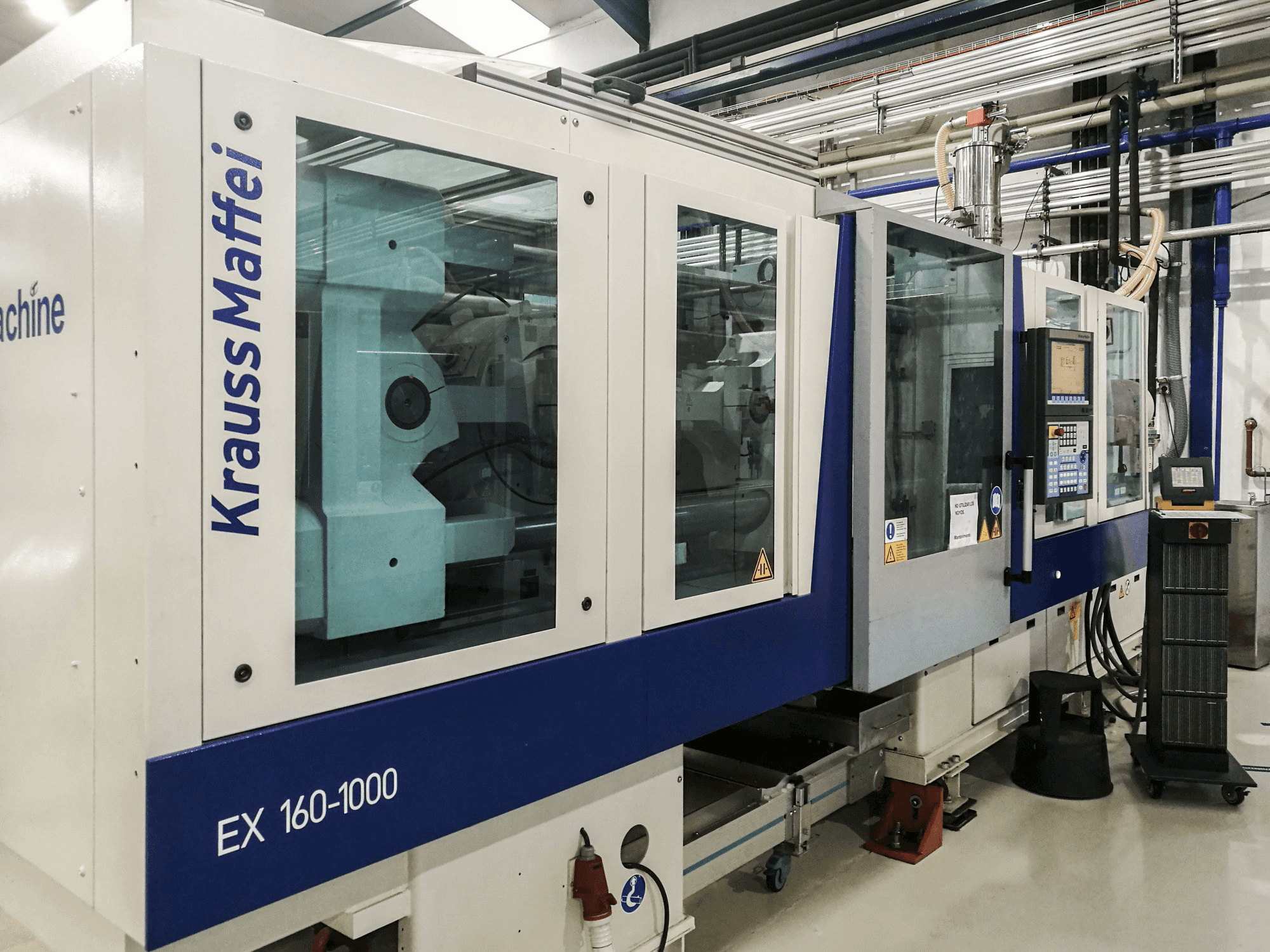 Links zicht van Krauss Maffei 160-1000 EX machine