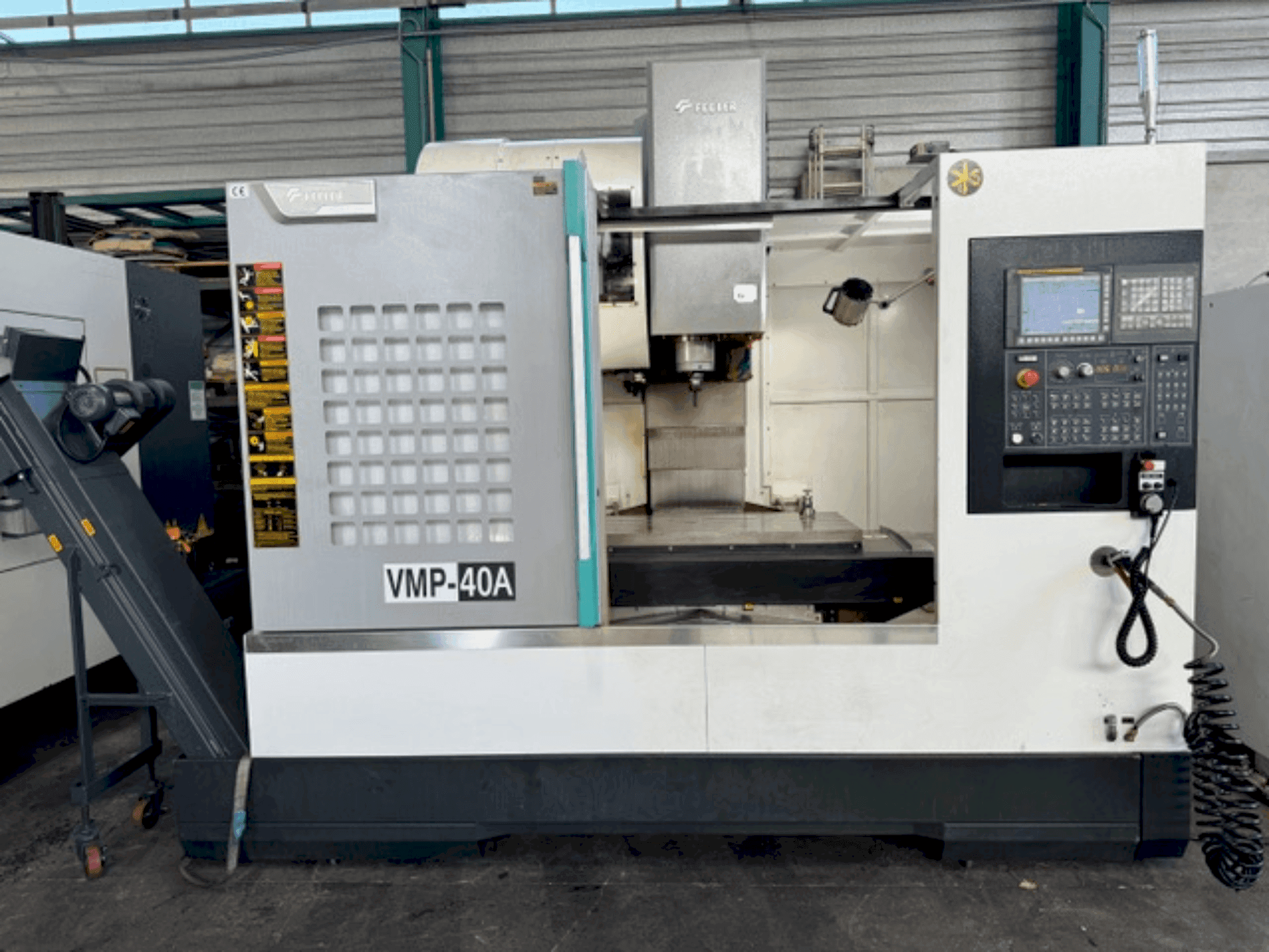 Vooraanzicht van Feeler VMP40A machine
