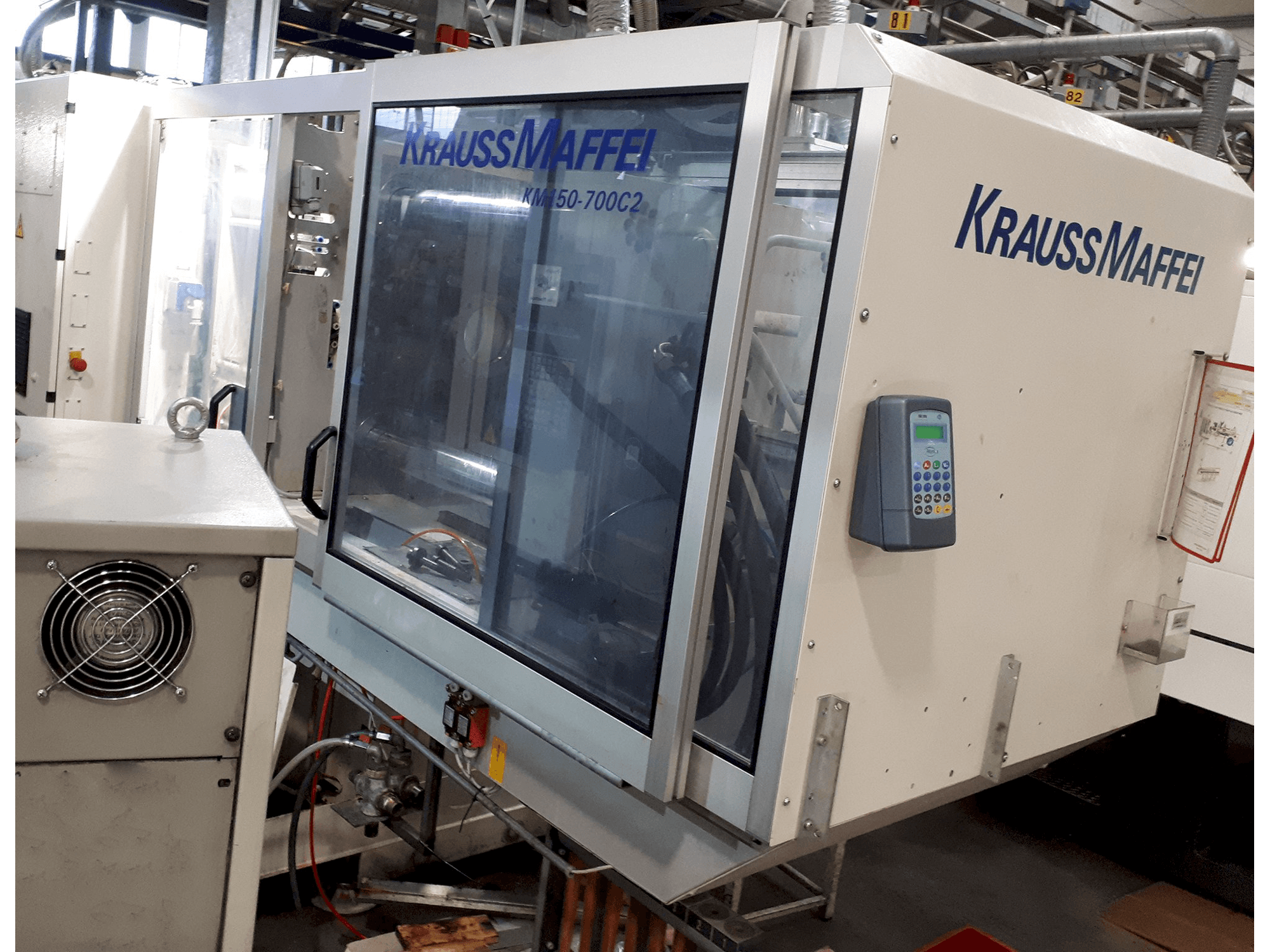 Recht aanzicht van Krauss Maffei C2 150-700 machine