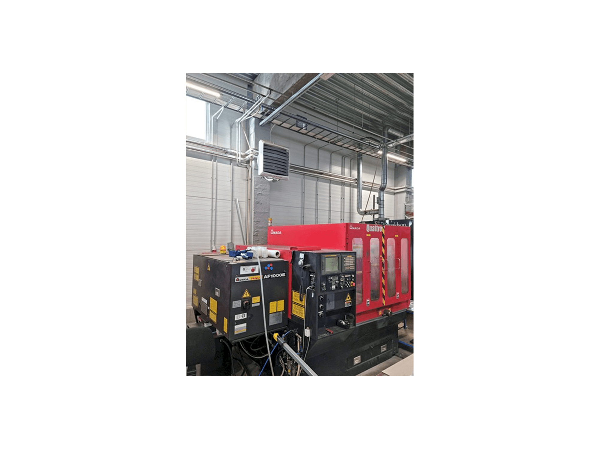 Linkerzijdeaanzicht van AMADA Quattro machine