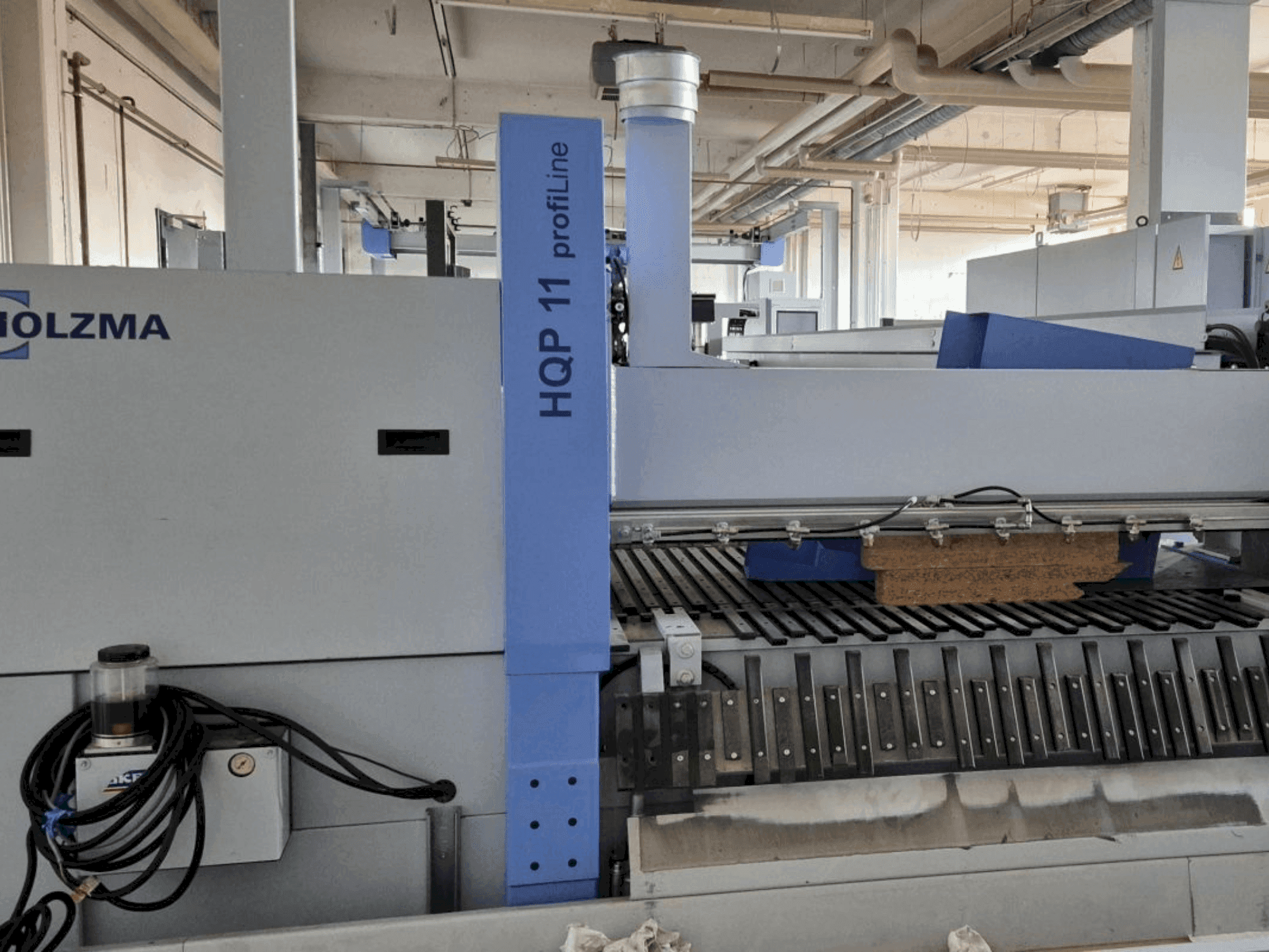 Vooraanzicht van HOLZMA PROFI HQP 11/16/56/L/X machine