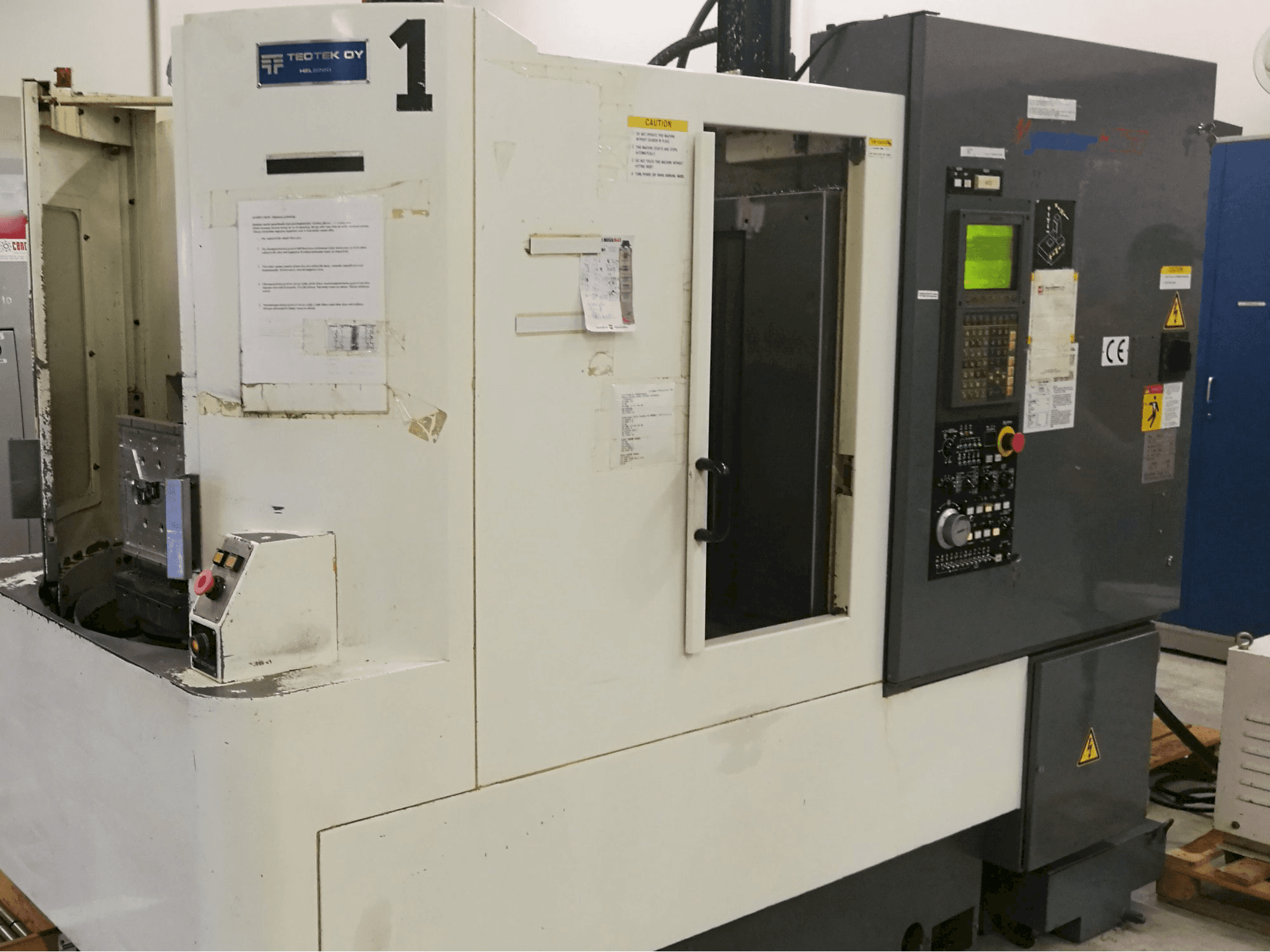 Links zicht van Kitamura Mycenter H250 machine