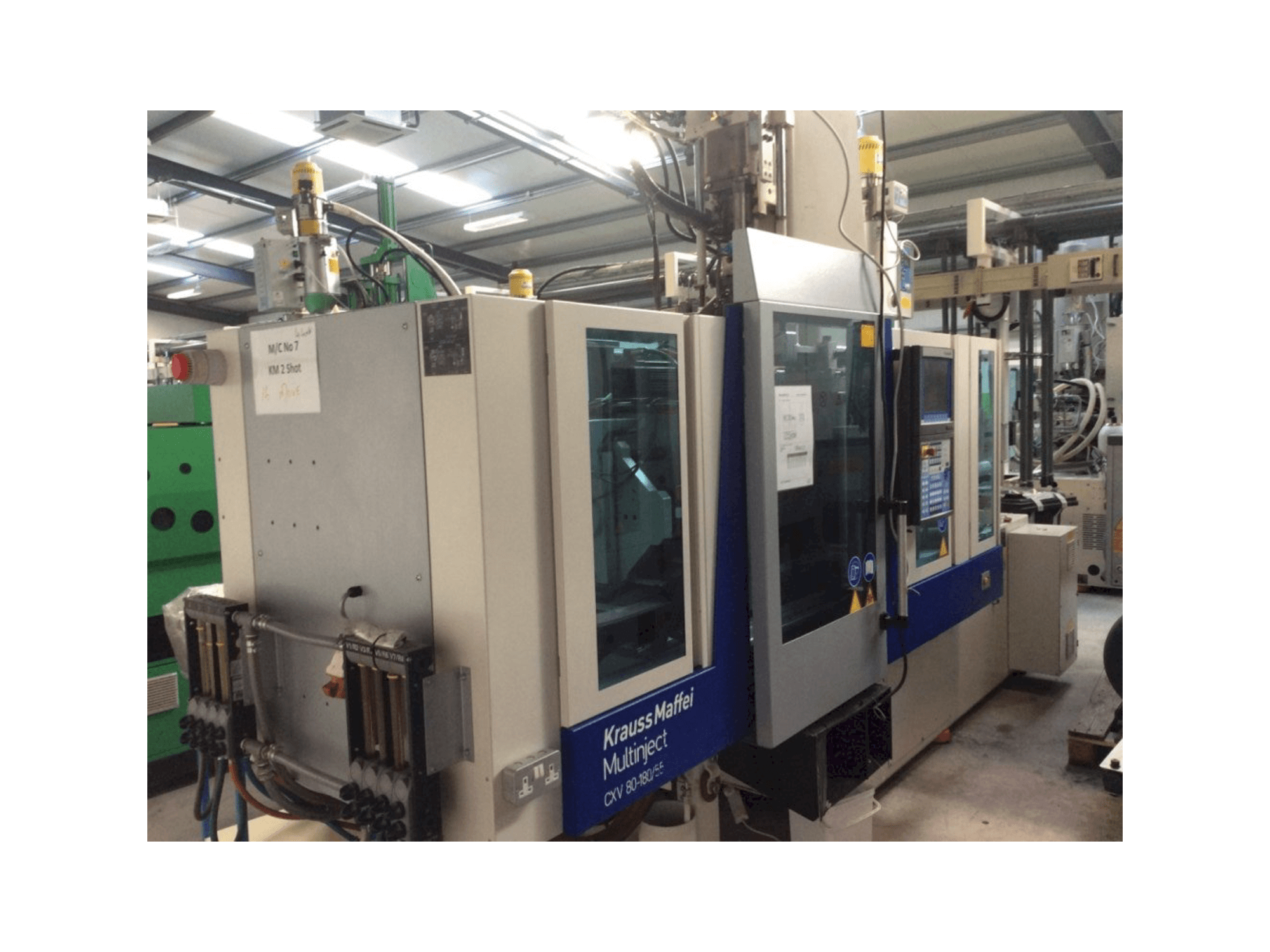 Vooraanzicht van Krauss Maffei Multinject 80-180-55 CX V machine