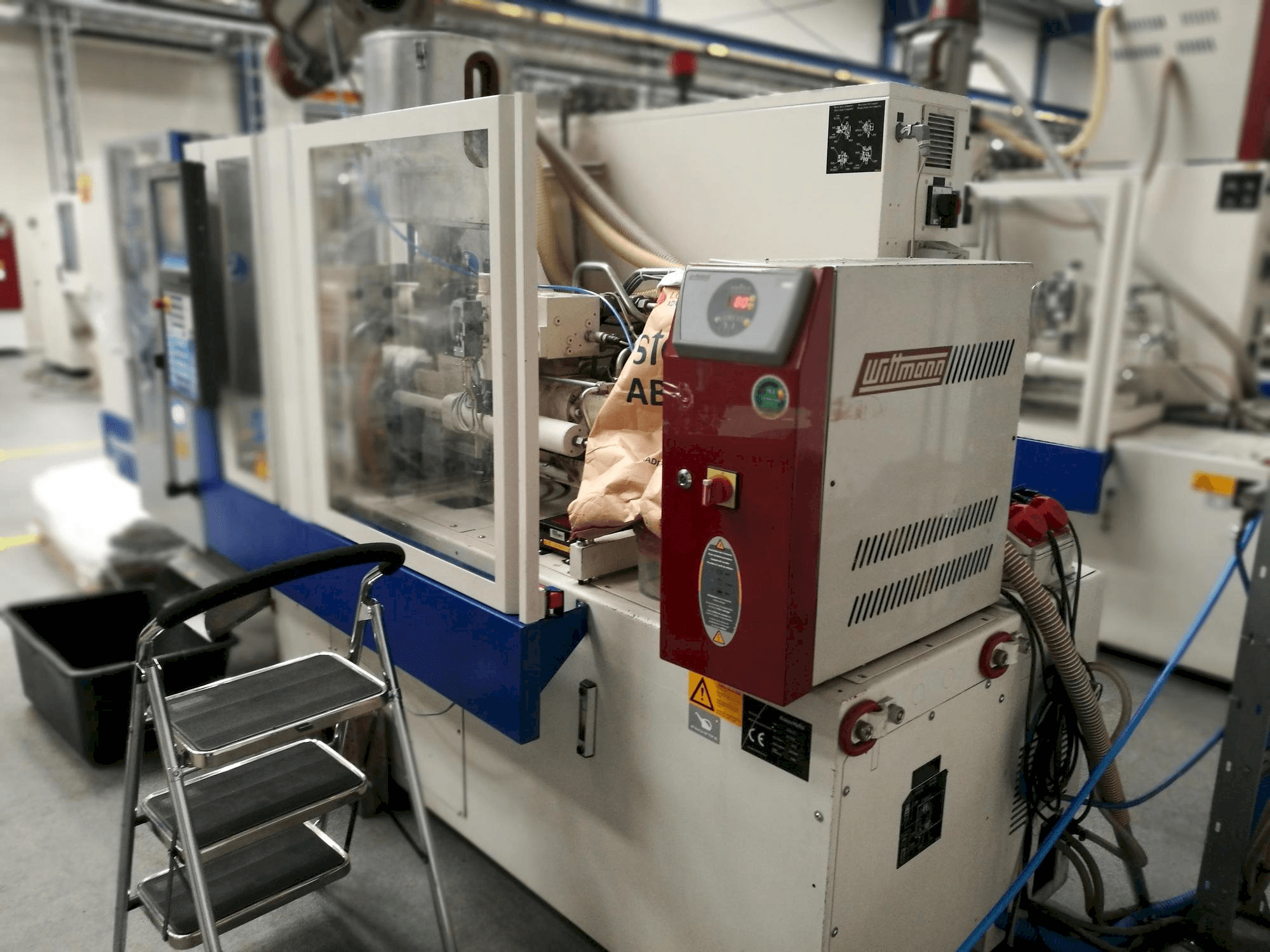 Vooraanzicht van Krauss Maffei KM 35-55 CX machine