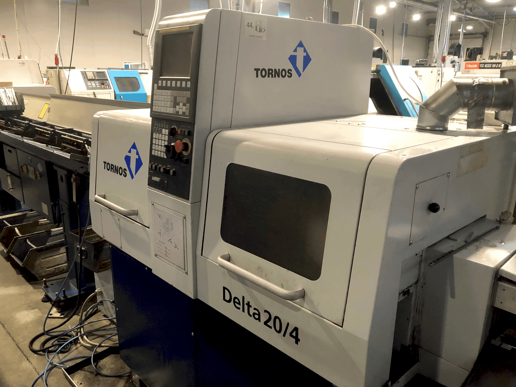 Vooraanzicht van TORNOS TORNOS DELTA 20/4 machine
